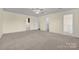 Spacious bedroom with neutral carpet and multiple closets, providing plenty of storage space at 4405 3Rd Nw St, Hickory, NC 28601