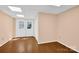 Finished room with hardwood floors, white doors, closet, and ample natural light at 4405 3Rd Nw St, Hickory, NC 28601