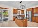 Kitchen with a center island, granite counters, stainless steel appliances, and backyard views at 4405 3Rd Nw St, Hickory, NC 28601