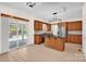 Traditional kitchen with wood cabinets, granite countertops, an island, and stainless steel appliances at 4405 3Rd Nw St, Hickory, NC 28601