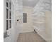 Walk-in pantry with ample shelving, offering plenty of storage space for food and household items at 4405 3Rd Nw St, Hickory, NC 28601
