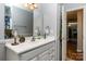 Bathroom featuring a white vanity with stylish accents and modern fixtures at 4813 Carving Tree Dr, Mint Hill, NC 28227