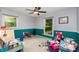 Bedroom featuring large windows, carpet floors, and a ceiling fan at 4813 Carving Tree Dr, Mint Hill, NC 28227