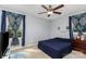 Bedroom featuring large window, ceiling fan, and carpet floors at 4813 Carving Tree Dr, Mint Hill, NC 28227