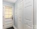 Hallway features a backdoor and closet doors at 4813 Carving Tree Dr, Mint Hill, NC 28227