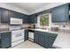 Functional kitchen with sleek countertops, ample cabinetry, and modern appliances at 4813 Carving Tree Dr, Mint Hill, NC 28227