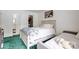 Brightly lit bedroom with a queen size bed, a closet, and neutral decor at 4816 Spring Lake Dr # B, Charlotte, NC 28212