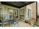 Enjoy the patio with its glass table and chairs, potted plants and outside access at 4816 Spring Lake Dr # B, Charlotte, NC 28212