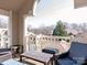 Inviting balcony with stylish outdoor furniture and views of the surrounding community and trees at 5007 Sharon Rd # R, Charlotte, NC 28210