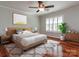 Spacious bedroom featuring a ceiling fan, large window, and hardwood floors at 5007 Sharon Rd # R, Charlotte, NC 28210