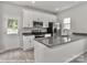 Modern kitchen featuring granite countertops, stainless steel appliances, and white cabinets at 552 Ridge Ave, Mooresville, NC 28115