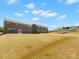 A very large backyard and exterior of a home. Perfect for entertaining at 5532 Muckross Ln, Fort Mill, SC 29707