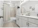 Bathroom features a shower-tub combo with a large vanity at 5532 Muckross Ln, Fort Mill, SC 29707