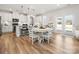 Eat-in kitchen features a white table and chairs, stainless appliances and natural light at 5532 Muckross Ln, Fort Mill, SC 29707