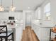 Bright kitchen with stainless steel appliances, pendant lighting, and a large kitchen island at 5532 Muckross Ln, Fort Mill, SC 29707