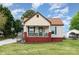 Charming single-story home featuring a welcoming front porch and a well-maintained lawn at 557 Hunter Ave, Kannapolis, NC 28083