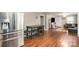 Open concept living space with hardwood floors connecting the kitchen and living area at 557 Hunter Ave, Kannapolis, NC 28083