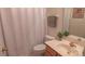 Bathroom features a single vanity, toilet, and a shower with a curtain at 6222 Meadow Glen Ln, Harrisburg, NC 28075