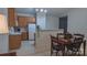Charming dining area adjacent to the kitchen, ideal for cozy meals and social gatherings at 6222 Meadow Glen Ln, Harrisburg, NC 28075