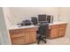 Functional home office space with built-in desk and storage at 6222 Meadow Glen Ln, Harrisburg, NC 28075