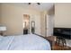 Bright bedroom with hardwood floors and ensuite bathroom access at 6352 Willow Farm Dr, Denver, NC 28037