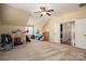 Spacious bedroom with sloped ceilings, carpet and lots of available floor space at 6352 Willow Farm Dr, Denver, NC 28037