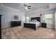 Large main bedroom featuring neutral colored walls, carpet, and a ceiling fan at 6352 Willow Farm Dr, Denver, NC 28037