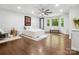 Spacious primary bedroom featuring a bay window, hardwood floors, and ample natural light at 6724 Brushwood Dr, Charlotte, NC 28262