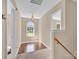 Upstairs hallway with wood-look flooring and lots of natural light at 7536 Bimini Ct, Sherrills Ford, NC 28673
