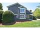 Charming home with a well-kept lawn, lush bushes, and classic siding at 8257 Legare Ct, Charlotte, NC 28210