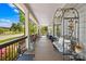 Inviting covered front porch with comfortable seating and decorative elements, perfect for relaxation at 911 Earl St, Shelby, NC 28150