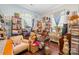 Cozy home office with built-in bookshelves, comfortable chair, and lots of storage space at 911 Earl St, Shelby, NC 28150