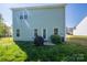 Spacious backyard featuring a patio and lush greenery for a serene outdoor space at 9112 Avery Meadows Dr, Charlotte, NC 28216