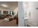 Half-bath with a pedestal sink and stylish decor at 9112 Avery Meadows Dr, Charlotte, NC 28216