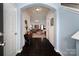 Bright living room with hardwood floors leading to the spacious living area at 9112 Avery Meadows Dr, Charlotte, NC 28216
