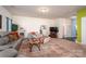 Spacious living room with comfortable seating and natural light at 9112 Avery Meadows Dr, Charlotte, NC 28216