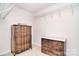 Spacious walk-in closet featuring built-in shelving and drawers, perfect for organizing clothes and accessories at 9208 Plashet Ln, Mint Hill, NC 28227