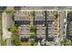 Bird's eye view of a townhome community featuring roof tops, landscaping and parking at 921 E 36Th St, Charlotte, NC 28205