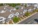 Aerial view of a new townhome community with sidewalks and landscaping in a suburban setting at 921 E 36Th St, Charlotte, NC 28205
