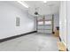 Clean garage with epoxy floor and storage space, and an electric door opener at 921 E 36Th St, Charlotte, NC 28205