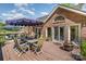 Charming back deck with outdoor seating, an umbrella, and a tranquil backyard view at 127 Fantasy Ln, Mooresville, NC 28117