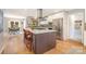 Well-equipped kitchen with stainless steel appliances and island with bar seating at 127 Fantasy Ln, Mooresville, NC 28117