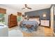 Comfortable main bedroom with a ceiling fan, accent wall, and natural light at 127 Fantasy Ln, Mooresville, NC 28117