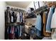 Organized walk-in closet with ample storage space for clothing and accessories at 13228 Crooked Pine Ct, Charlotte, NC 28215
