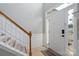 Bright entryway featuring a staircase, tiled floors, and a front door with sidelight windows at 13228 Crooked Pine Ct, Charlotte, NC 28215
