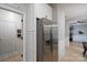 Spacious kitchen area with stainless steel refrigerator and ample cabinet space at 13228 Crooked Pine Ct, Charlotte, NC 28215