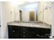 Bathroom features a dual sink vanity with granite counters and a large mirror at 1333 Rainier Dr, Fort Mill, SC 29708