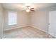 Cozy bedroom features a ceiling fan, carpet flooring, and a window that lets in natural light at 1333 Rainier Dr, Fort Mill, SC 29708