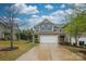 Beautiful townhome with a two-car garage and well-maintained landscaping at 1333 Rainier Dr, Fort Mill, SC 29708