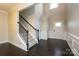 Bright foyer features hardwood floors and a staircase leading to the upper level at 1333 Rainier Dr, Fort Mill, SC 29708